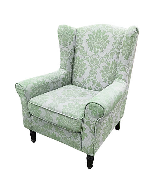 istock armchair green flower fabric isolate on white, clipping path. 523403244