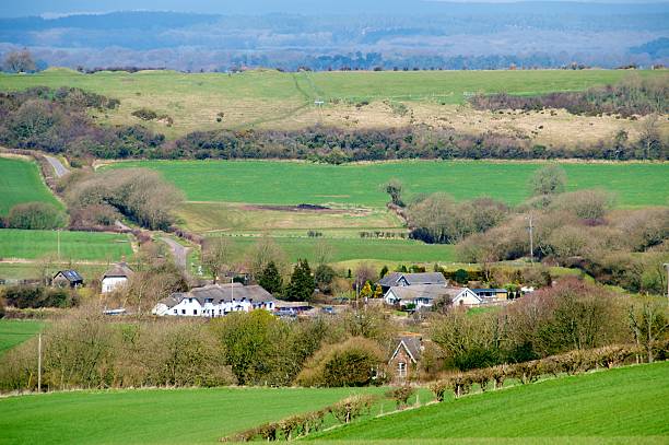 istock English country village among fields 523403918