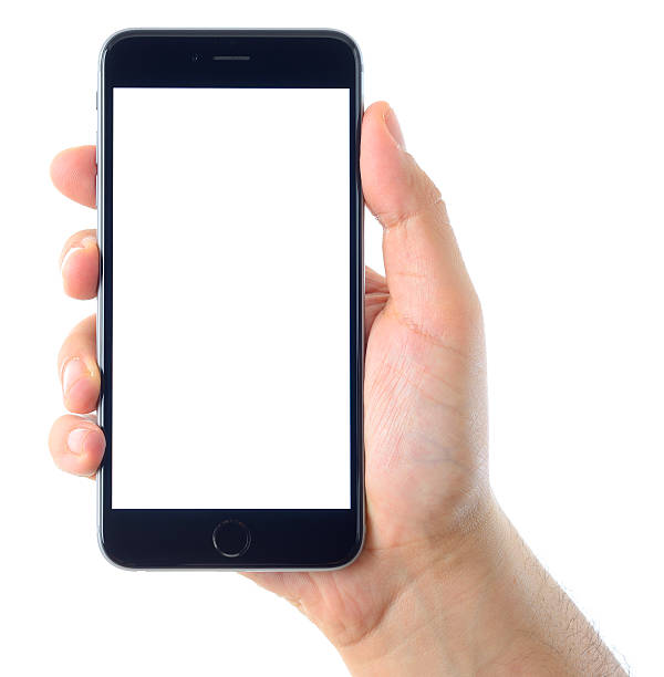 Hand holding blank white screen iPhone 6 Plus İstanbul, Turkey - April 7, 2016: Man hand holding an Apple iPhone 6 Plus displaying blank white screen on a white background. The iPhone 6 Plus is a touchscreen smartphone developed by Apple Inc. iphone hand stock pictures, royalty-free photos & images