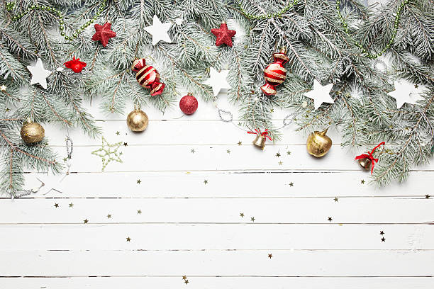 istock Christmas or New Year decoration background: fur-tree branches, colorful 523407640