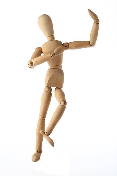 istock mannequin old wooden dummy dancing thai style isolated on white 523413865