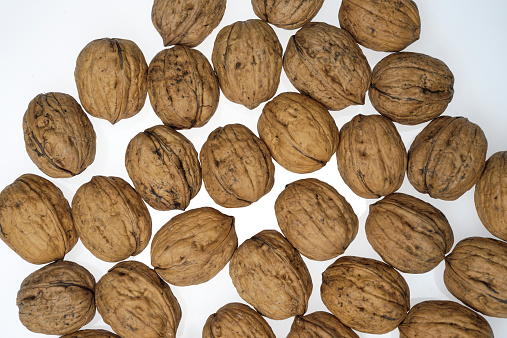 nuts, organic, natural, cultivation, earth, white background, detail, enlargement,
