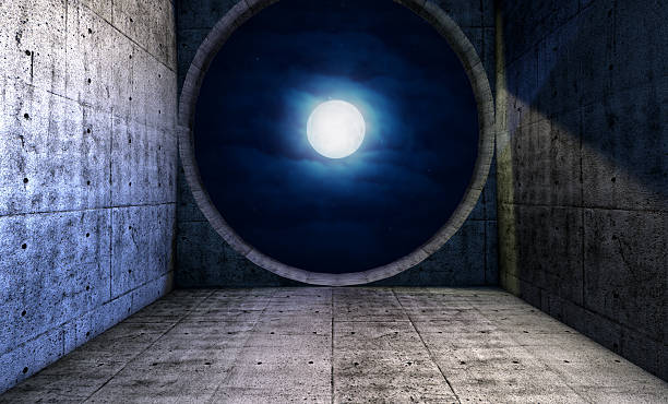istock Full moon seen through a round window opening 523417317