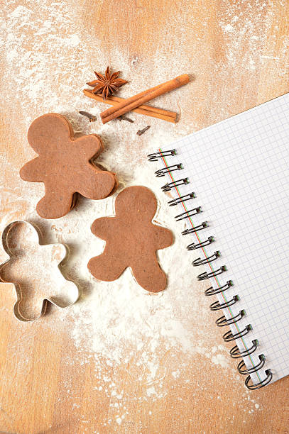 istock Christmas list. The dough for gingerbread. Notebook, gingerbread and flour 523430971