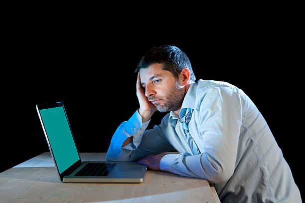 istock businessman working with computer laptop in frustration and depression 523432949