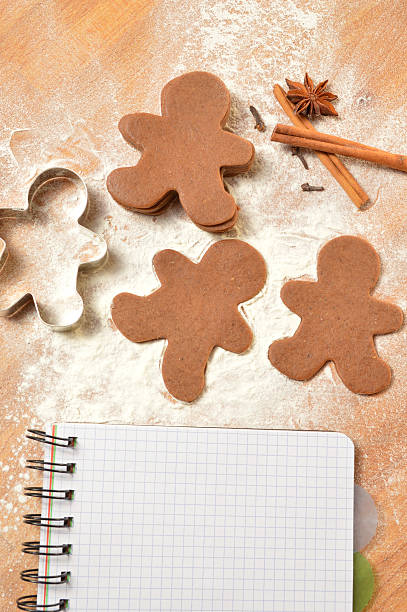istock Christmas list. The dough for gingerbread. Notebook, gingerbread and flour 523443081