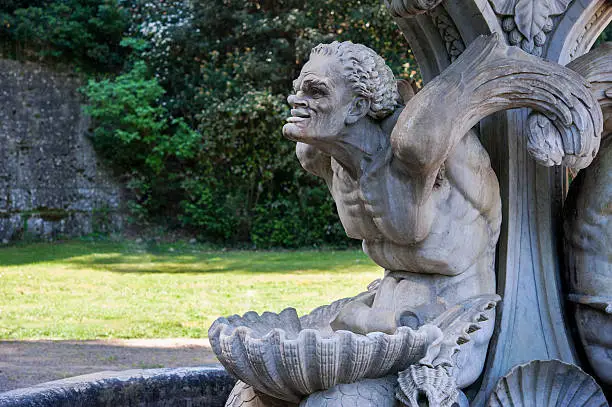 A triton located in a fountain in Villa Chigi's garden