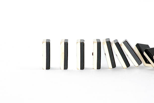 istock Row of dominoes falling 523446141