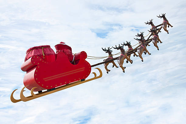 Farewell Santa Claus Santa Claus riding a sleigh in a day light led by reindeers. rudolph the red nosed reindeer photos stock pictures, royalty-free photos & images