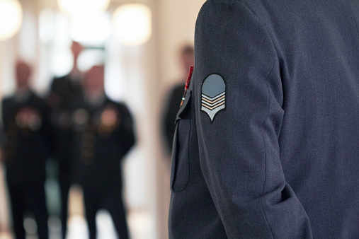 Shot of a military badge on a high ranking officer's jacket