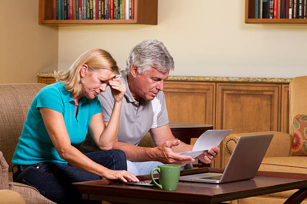 istock Senior Couple Stressed Out Over Bills 523459421