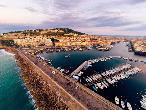 aerial view of the city of sete, france, with mont saint-clair and port. photo taken at sunrise.