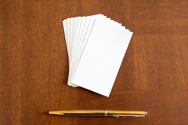 istock white cards and a pen 523461897