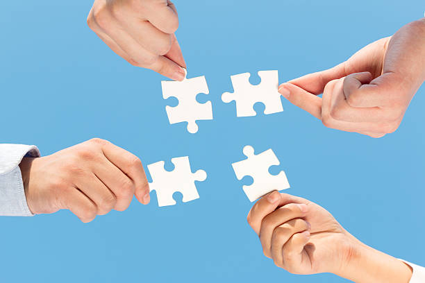 istock puzzle jigsaw and concept with sky background 523462247