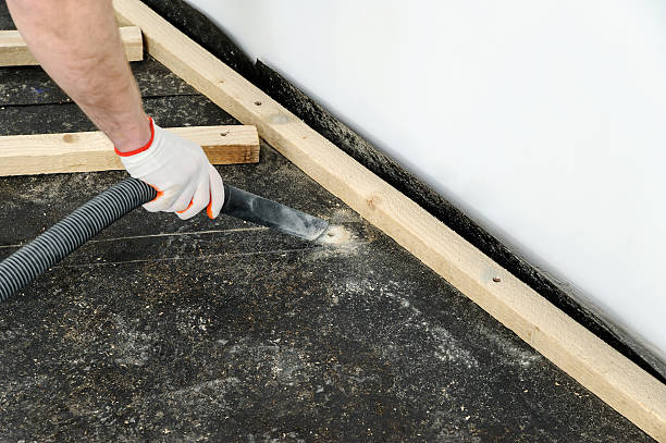 istock Worker cleans the dust on the floor. 523469378