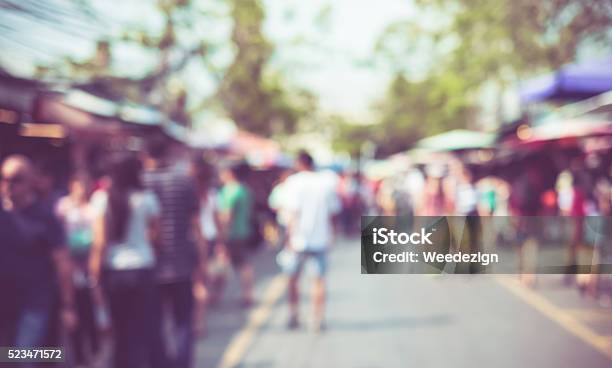 Blurred Background People Shopping At Market Fair Stock Photo - Download Image Now