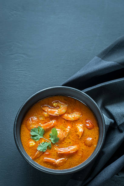 istock Bowl of thai yellow curry with seafood 523472120