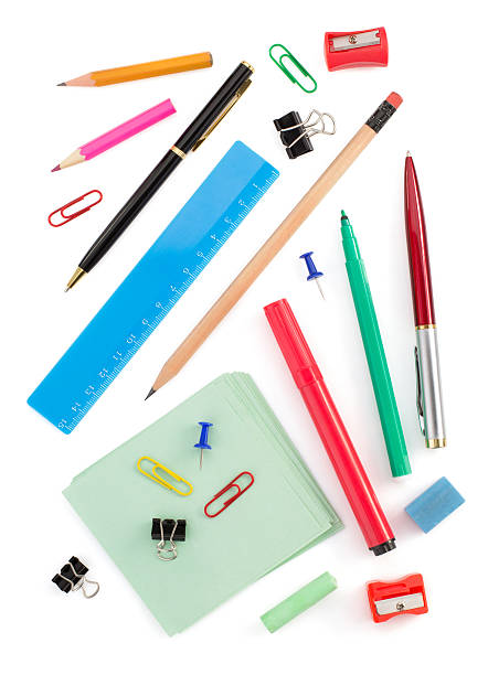 materiale scolastico su bianco - ruler ballpoint pen pen isolated foto e immagini stock