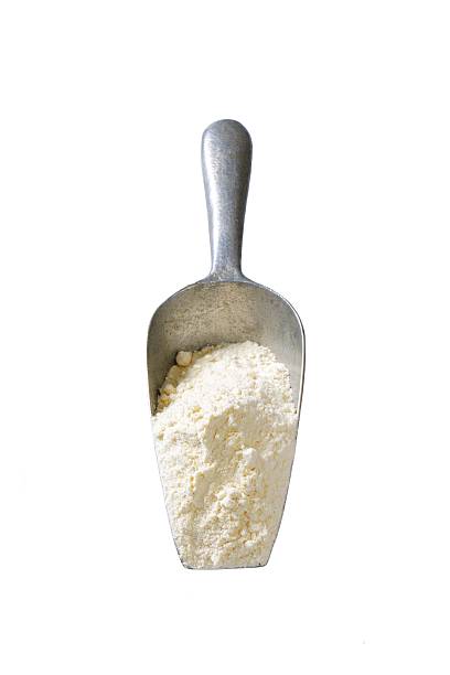istock Scoop of wheat flour 523472307