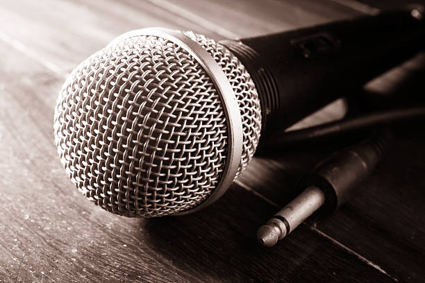 istock Black and white filtered of microphone. 523473035