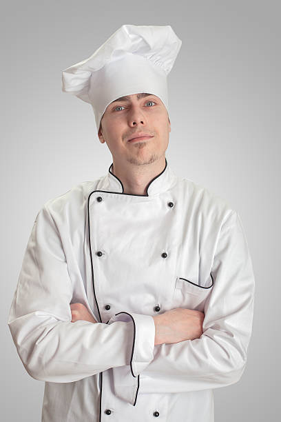 istock young cook man standing on a white background 523473494