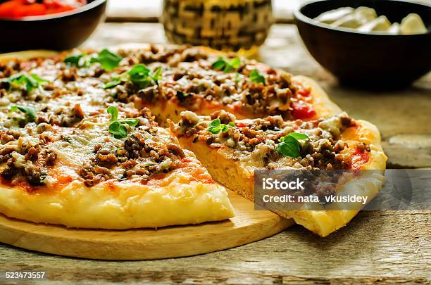 Pizza With Meat Mozzarella And Oregano Stock Photo - Download Image Now - Appetizer, Baked, Baked Pastry Item