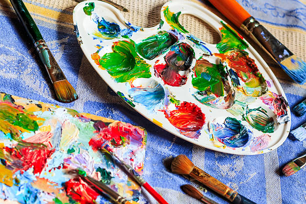 istock Different types of brushes, oils and palette 523475118