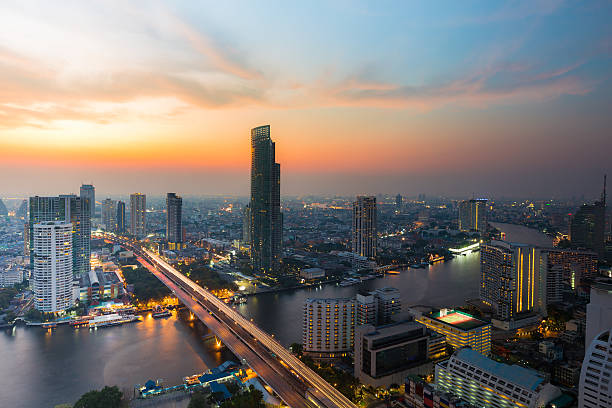 istock Sunset, dramatic sky over Bangkok city river curved, Thailand 523475136