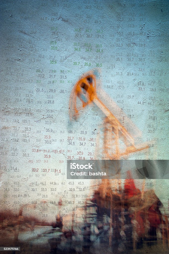 Oil and gas industry background. Work of oil pump jack on a oil field and finance analytics background. Textured concrete grunge, blurred motion. Numbers, figures. Concept oil and gas crisis. Backgrounds Stock Photo