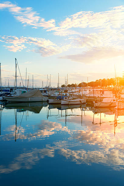 istock Harbor of Palma de Mallorca in sunset with cloud mirroring 523475512