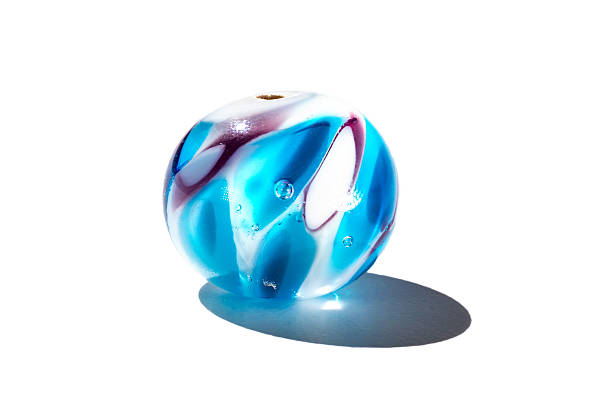 istock Hand made transparent blue glass bead 523476514