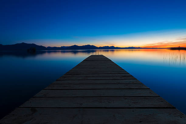 Wooden Jetty into Lake Chiemsee at blue hour