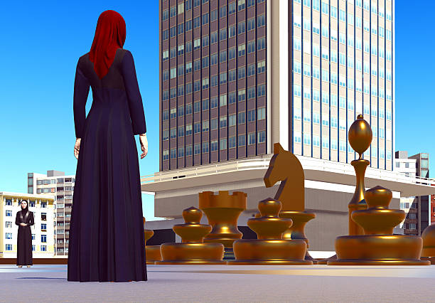 Business people on chess board