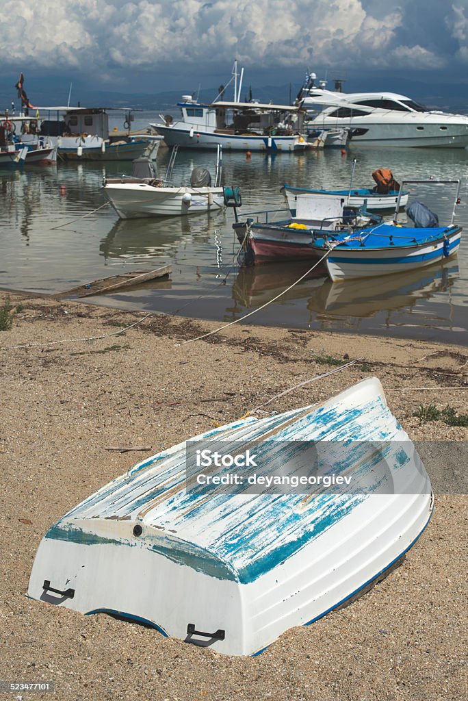 Fishing boats Fishing boats in Greece. Day light Bay of Water Stock Photo