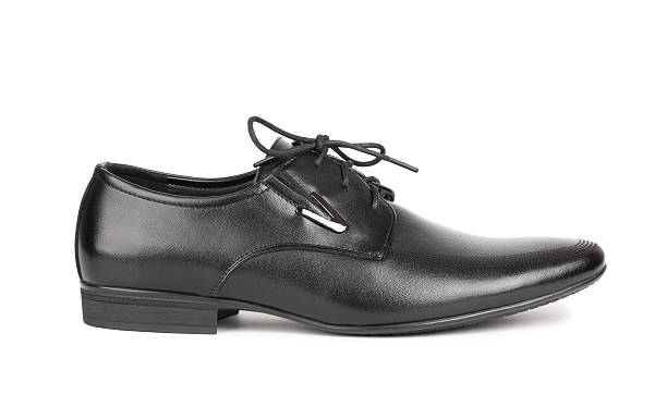 istock Black elegant men's shoes on white background 523477516