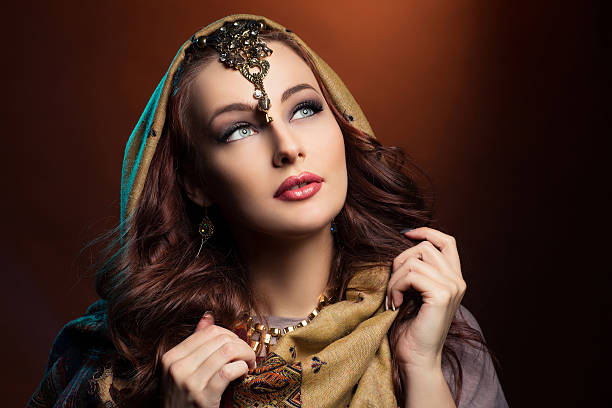 istock Beautiful young woman in shawl 523478168