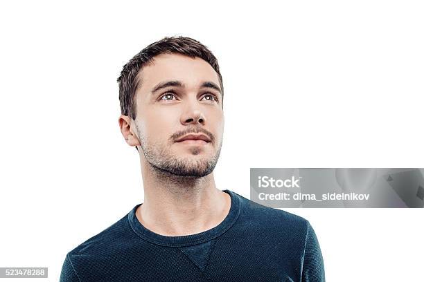 Handsome Young Man On White Background Stock Photo - Download Image Now - Portrait, Looking Up, Men