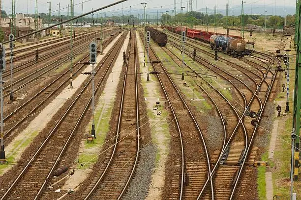 Many railway tracks at a station
