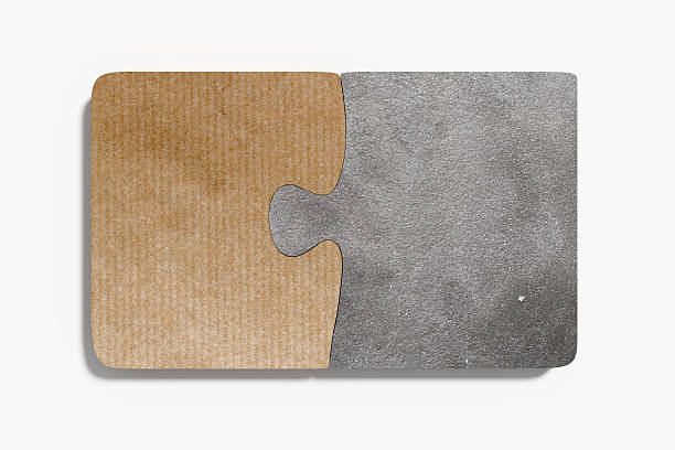 istock Connected puzzle pieces made of some materials 523481064