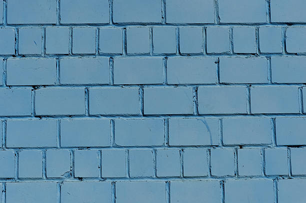 istock Brick wall. Wall painted in blue color. Texture 523483650