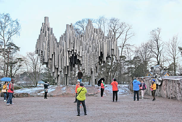 Helsinki, Finland - April 23, 2016: Chinese and european people take pictures near The Sibelius Monument in The Sibelius Park. The Monument dedicated to the Finnish composer Jean Sibelius. Was built in 1967.