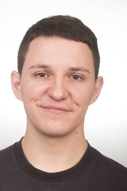 istock Smirking face close up portrait. 523485318