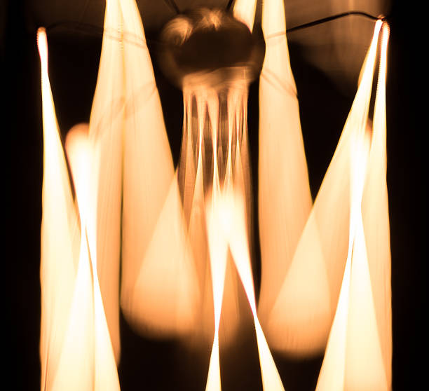 istock Incandescent fillament bulb macro photograph 523485552