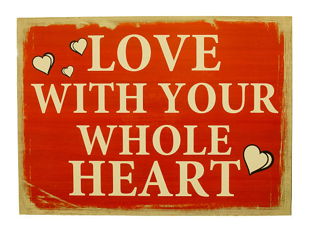 istock Plate with inscription LOVE WITH YOUR WHOLE HEART. 523486044