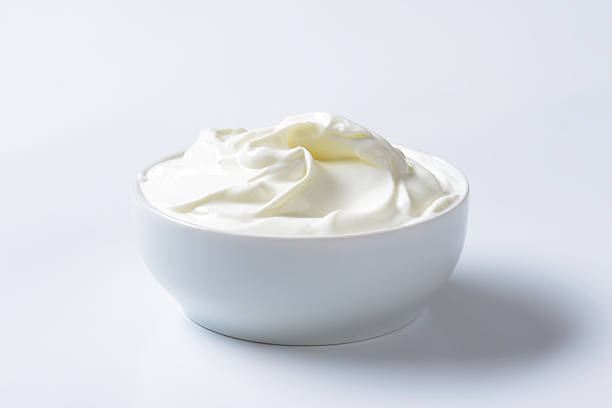 bowl of sour cream bowl of smooth sour cream curd cheese photos stock pictures, royalty-free photos & images