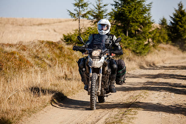 istock Motorbiker travelling in autumn mountains 523488910