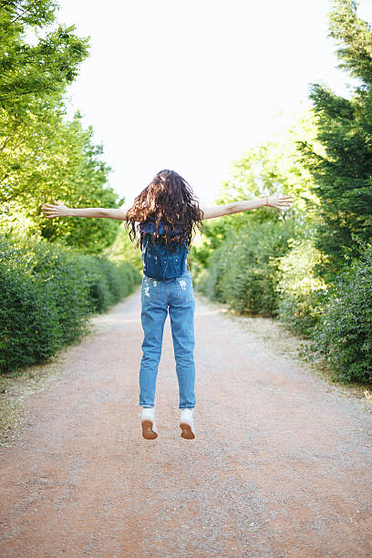 istock Attractive happy woman in nature 523489606