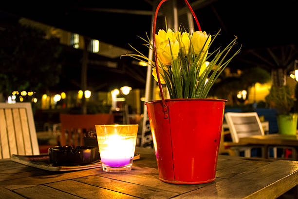 istock Tables with candles in restaurant 523489620