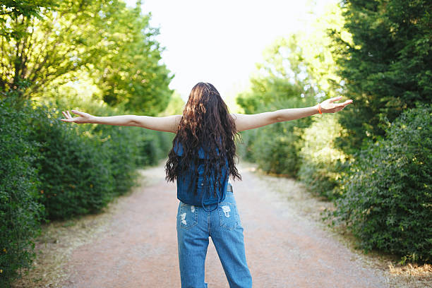 istock Attractive happy woman in nature 523489876