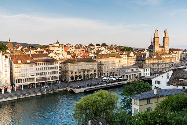 Zurich at evening of July 4, 2015 Famous postcard view of various houses and churches in the old town part of Zurich at sunset on July 4, 2015. Zurich is the biggest city in Switzerland. switzerland zurich architecture church stock pictures, royalty-free photos & images